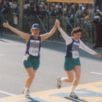 Judy Quint and Jamie Gossels cross the Boston Marathon finish line in 1999