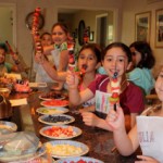 IMG_1633 children making fruit kabobs in a Yum101! cooking class